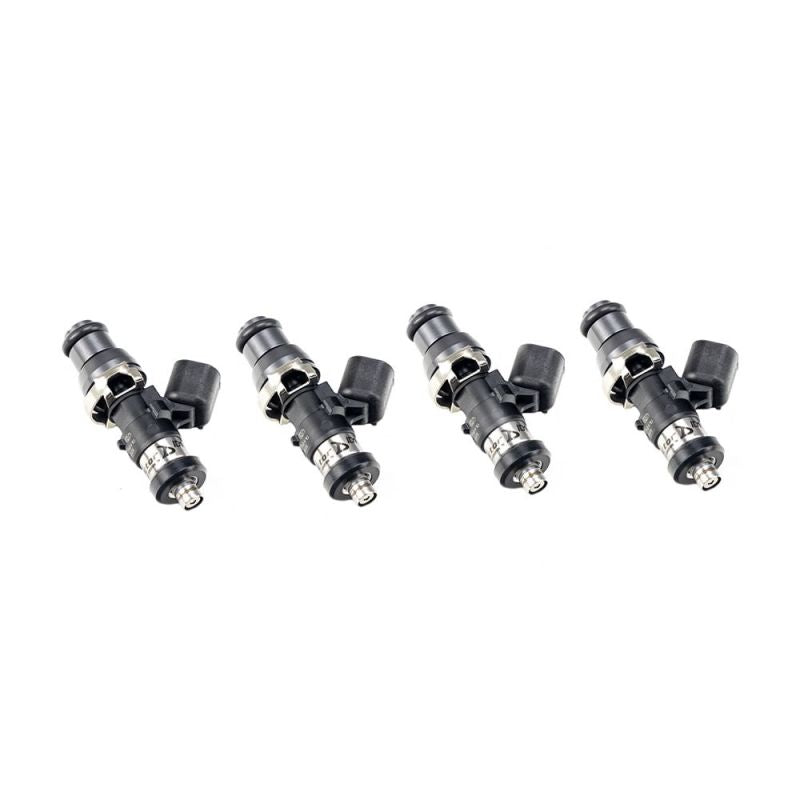 Injector Dynamics ID1050X fuel injectors, set of 4, side view showing electrical connectors and lower fuel tips.