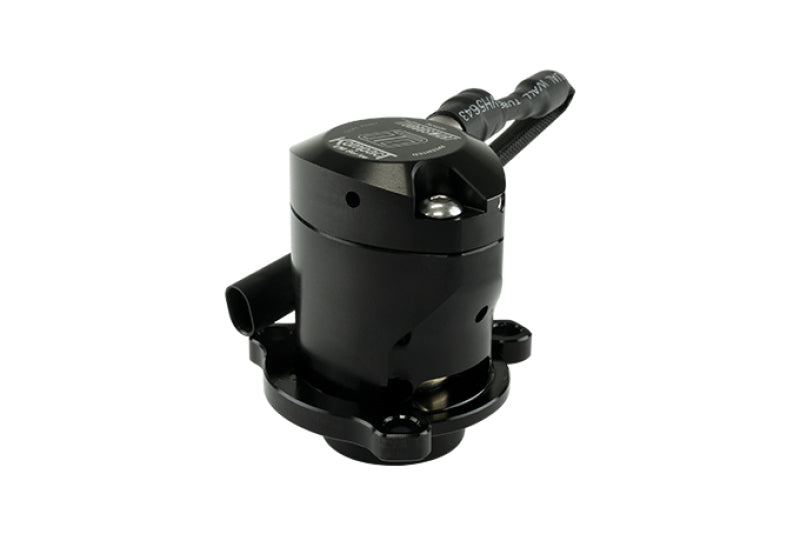 Turbosmart Kompact EM Dual Port BOV, black anodized body, top hose barb and side ports visible, angled view