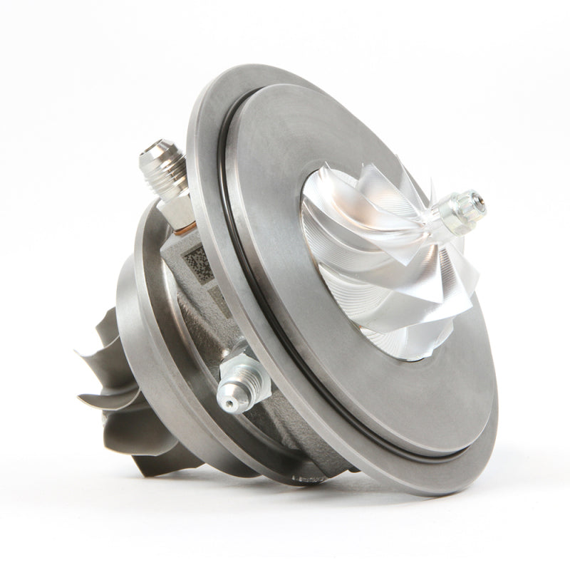 Garrett G25-700 reverse rotation CHRA, angled view showing compressor wheel, oil fittings and housing.