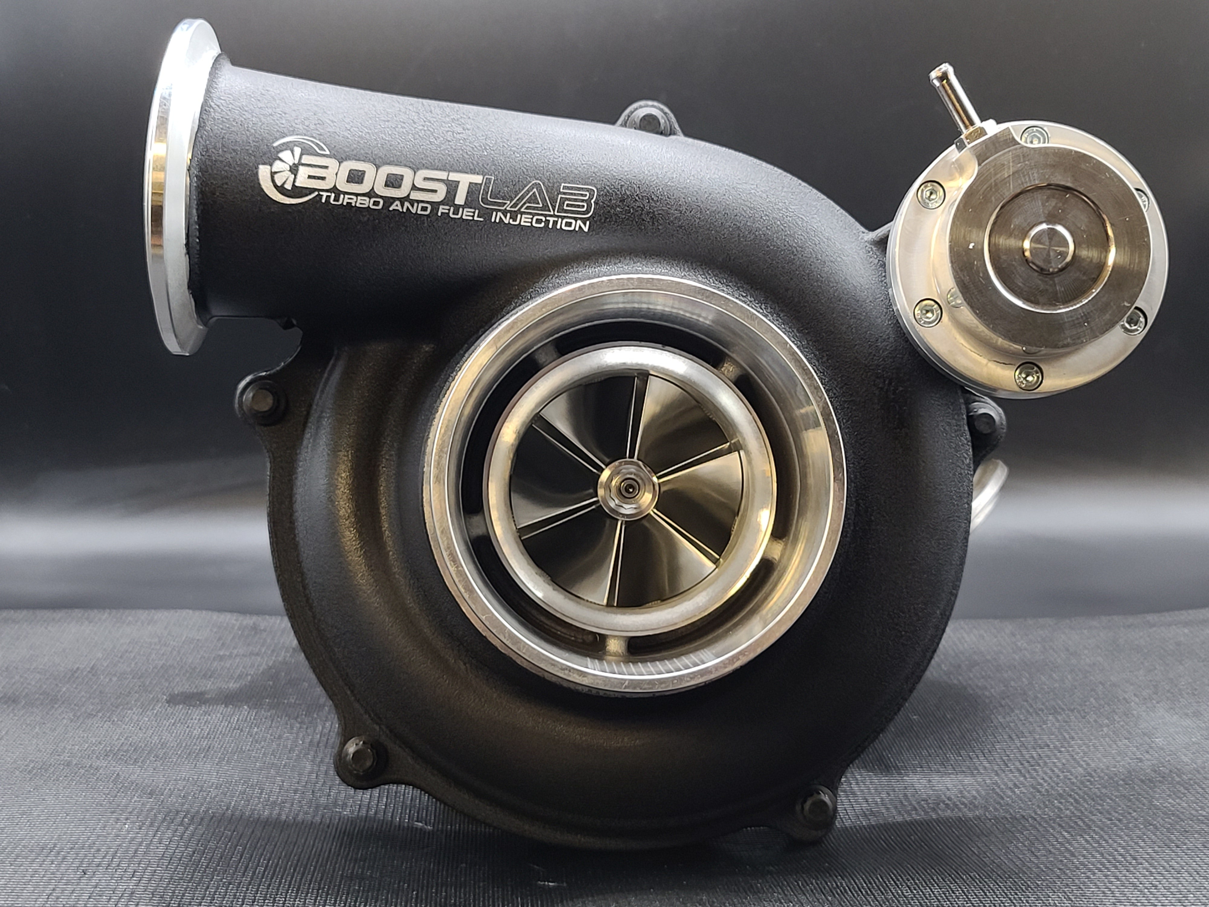 Boost Lab GTP38 66/73 turbocharger, front view showing billet compressor wheel and wastegate