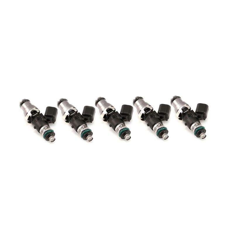 Set of five Injector Dynamics 2600-XDS fuel injectors, angled view showing tops, connectors and o-rings.