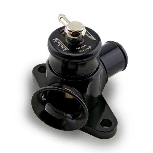 Turbosmart Kompact Dual Port BOV, black anodized body, top view showing spring adjuster and inlet flange