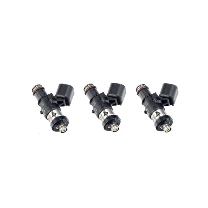 Set of three Injector Dynamics ID1050X fuel injectors for Yamaha YXZ1000 UTV, side view showing electrical connectors and O-rings