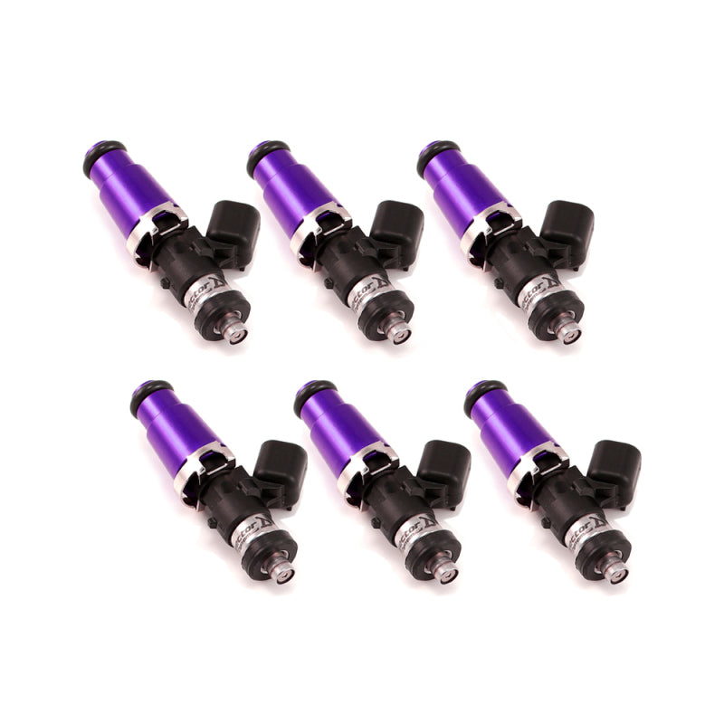 Set of six Injector Dynamics 2600-XDS fuel injectors, purple bodies, black connectors, angled view