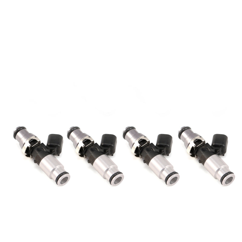 Set of four Injector Dynamics 2600-XDS fuel injectors, side angle, black connectors, silver bodies