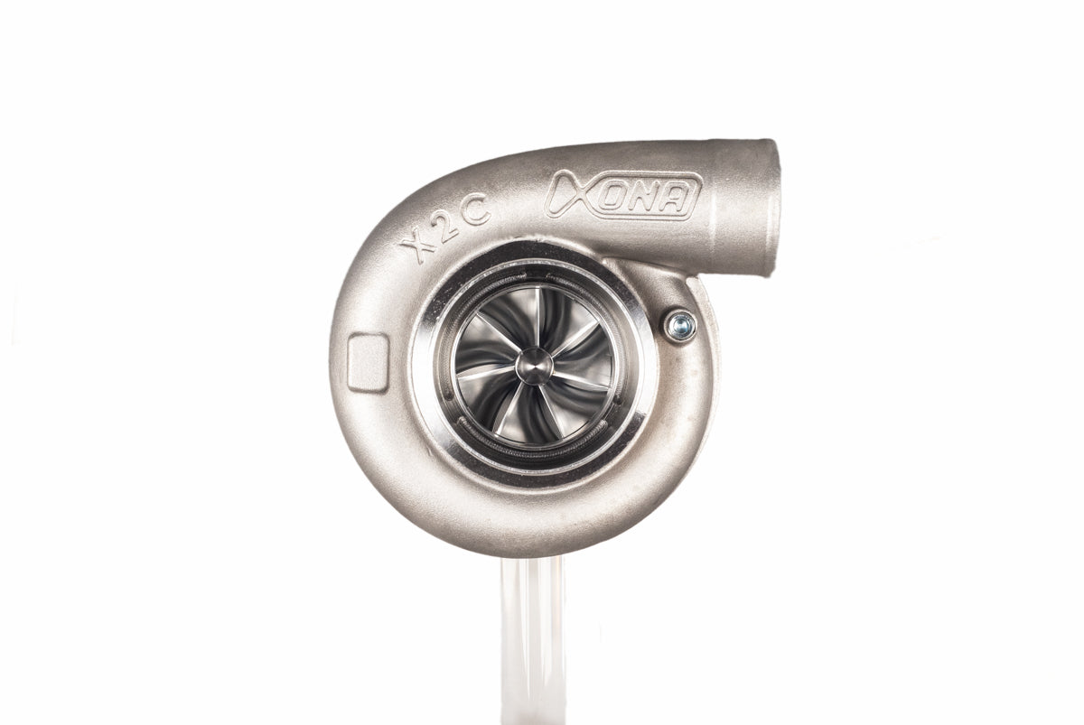 Xona XR 6564S X2C turbocharger, front view showing compressor wheel, housing, and outlet flange