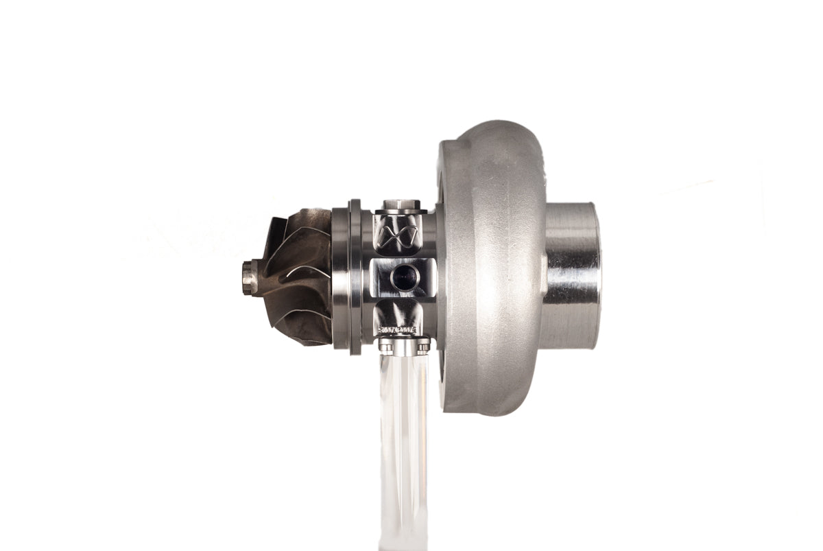 Xona XR 7864S X2C turbo, side angle showing compressor wheel, bearing housing and clear stand mount.