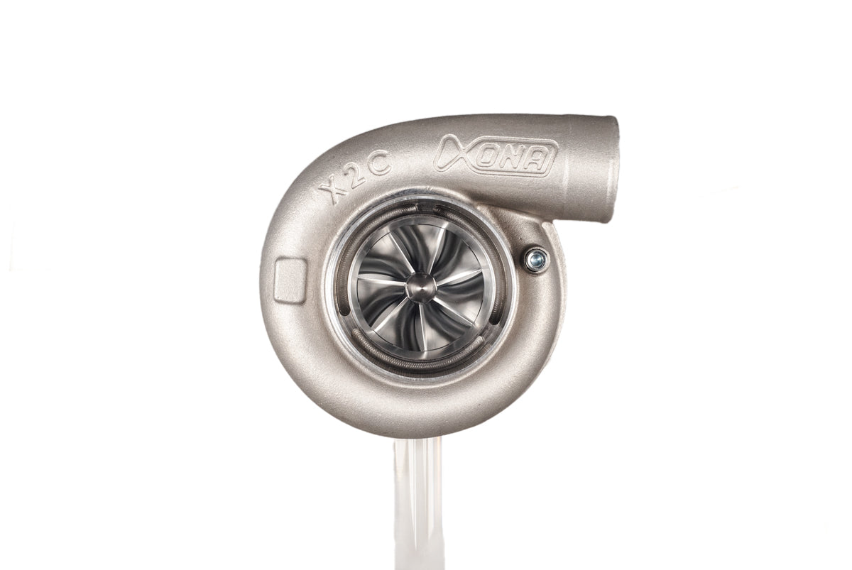 Xona XR 7164S X2C turbocharger, front view showing compressor wheel, housing and inlet elbow.