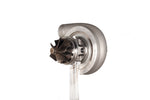 Xona XR 7164S X2C turbo CHRA, front angle showing compressor wheel and clear acrylic mounting stand.