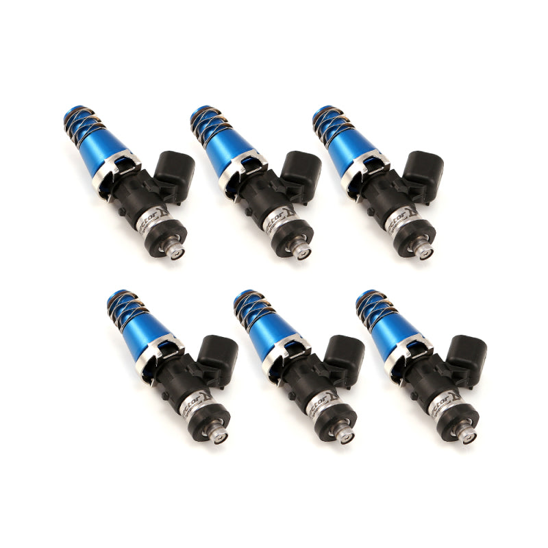 Set of six Injector Dynamics 2600-XDS fuel injectors, blue bodies with black connectors, angled view