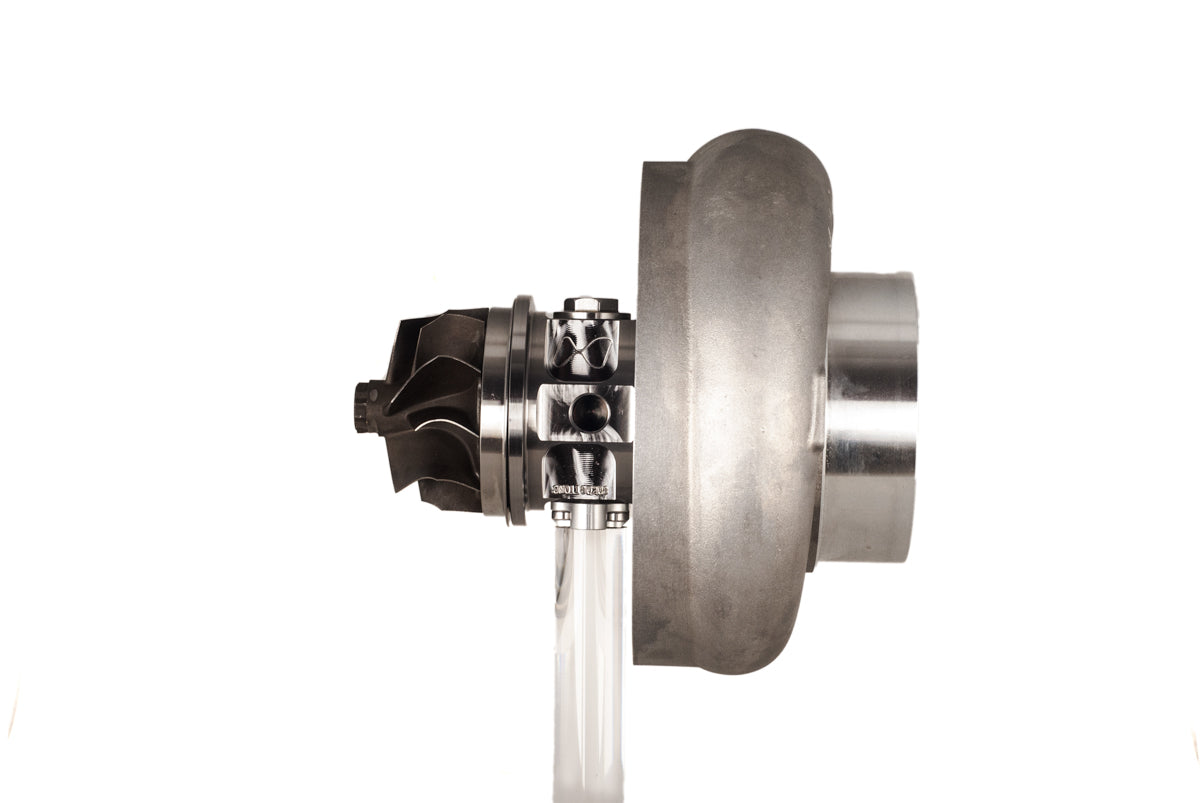 Xona XR 7864S X3C turbo, side view showing compressor wheel, housing and clear coolant lines