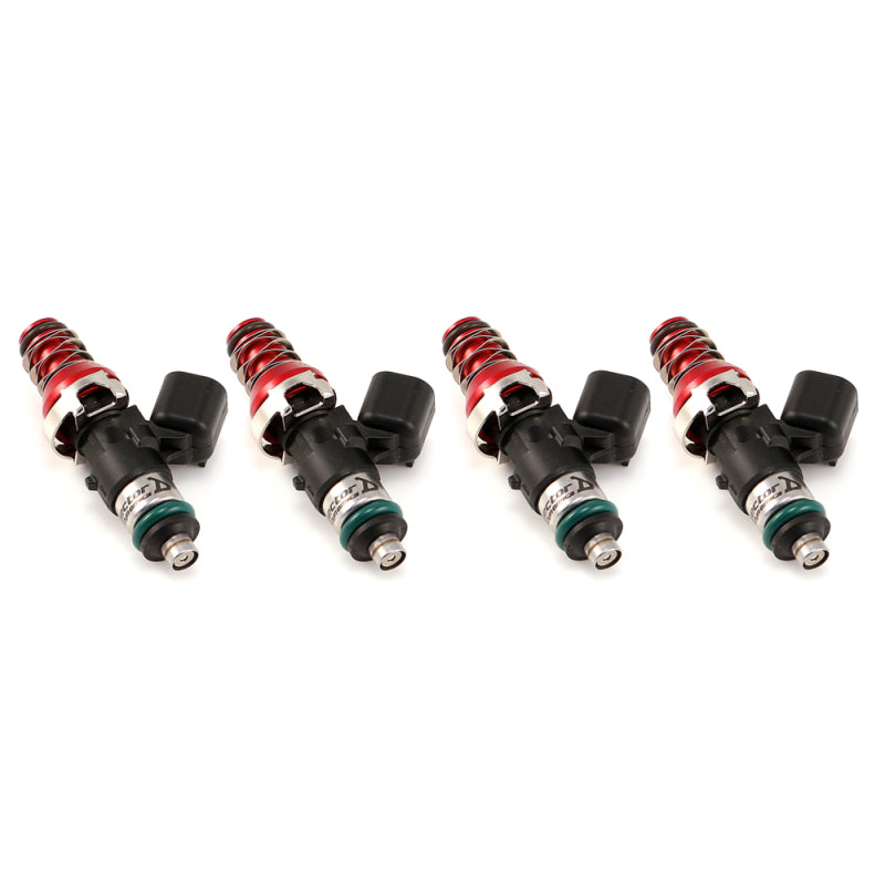 Injector Dynamics 2600-XDS fuel injectors, set of four, angled view showing red adapter tops and O-rings