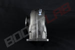 Side view of Borg Warner S200SX T4 .91 A/R twin scroll turbine housing showing wastegate flange and mounting studs