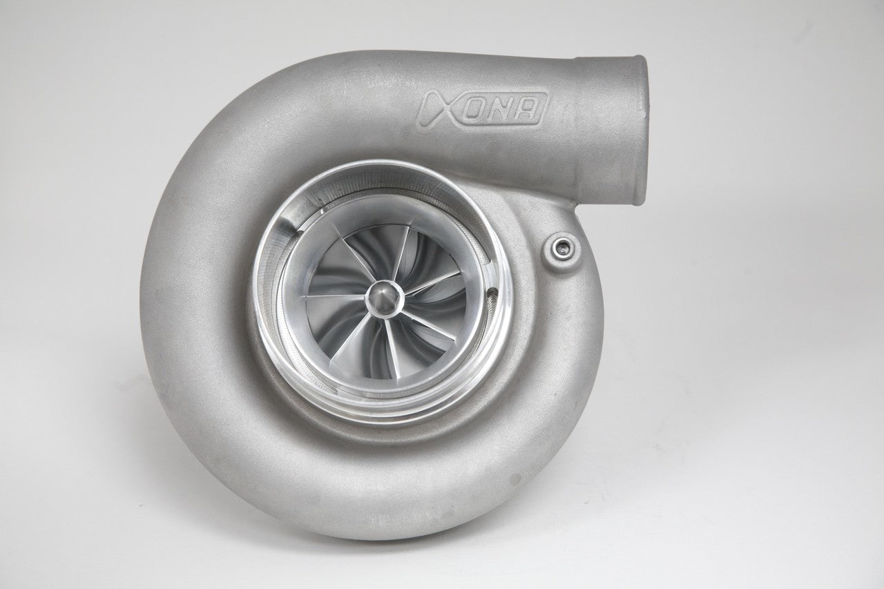Xona Rotor 115-68 X4C turbo, front view showing compressor wheel, housing and inlet, cast metal finish.