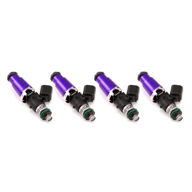 Set of four Injector Dynamics 2600-XDS fuel injectors, purple bodies with black electrical connectors, side view.