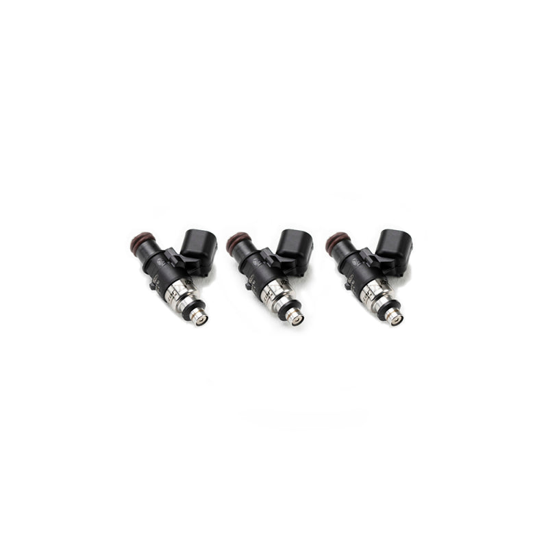 Set of three Injector Dynamics 1300-XDS fuel injectors for YXZ1000, machined tops, electrical connectors and O-rings visible.