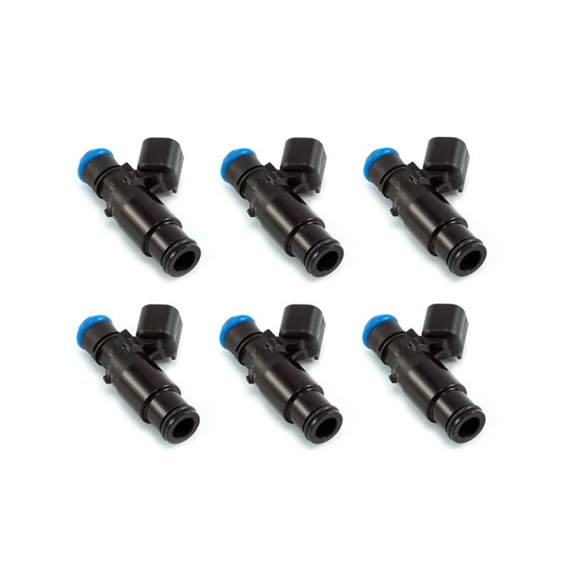 Injector Dynamics ID1050X fuel injectors, set of six, black body with blue top connectors, 14mm bottom adaptors visible.