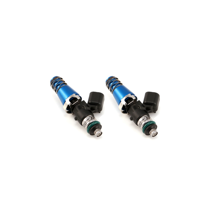Pair of Injector Dynamics ID1300 fuel injectors, blue bodies, black connectors, angled view