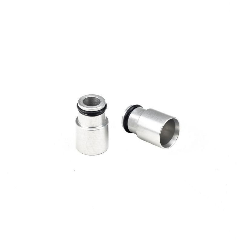 Injector Dynamics +12mm bottom adapter, clear anodized, two units shown side by side with 14mm lower o-rings visible.