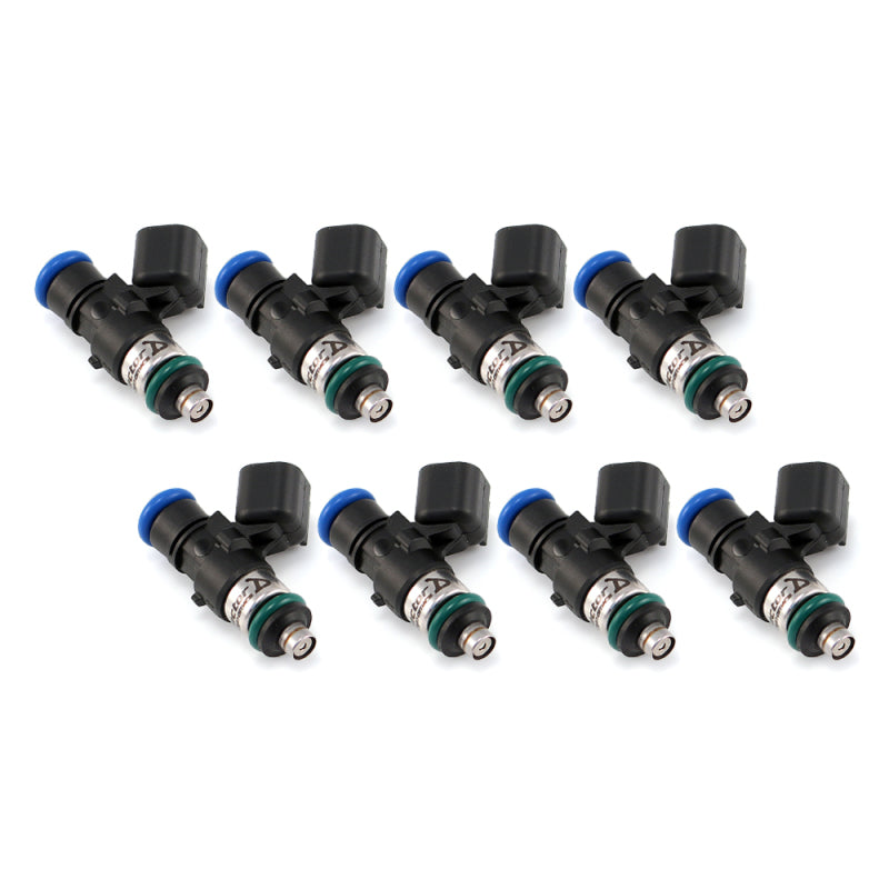 Set of eight Injector Dynamics 1340cc fuel injectors, angled view showing connectors and o-rings
