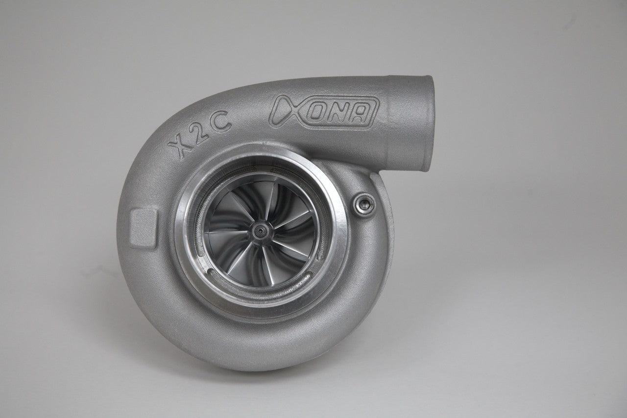 Xona Rotor 71-64 X3C turbo, front compressor housing view showing wheel and inlet, gray finish
