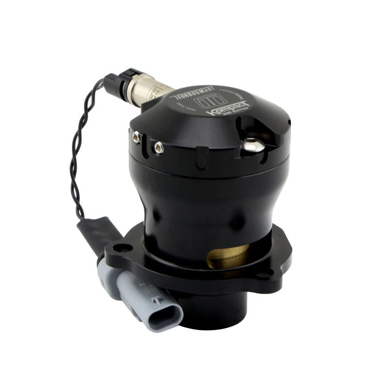 Turbosmart Kompact EM VR2 Dual Port BOV, black anodized body, top angle showing electrical connector and mounting flange