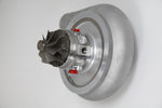 Xona Rotor 95-69S X3C turbo cartridge, compressor wheel and housing angled view, red fittings visible