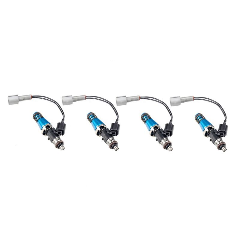Set of four Injector Dynamics ID1300 fuel injectors with wiring connectors, side view