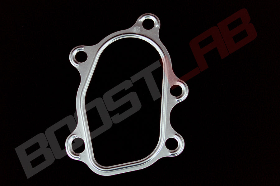 5-bolt gasket for Garrett T25 flanged GT28/30R-WG turbine housing, angled top view on black background