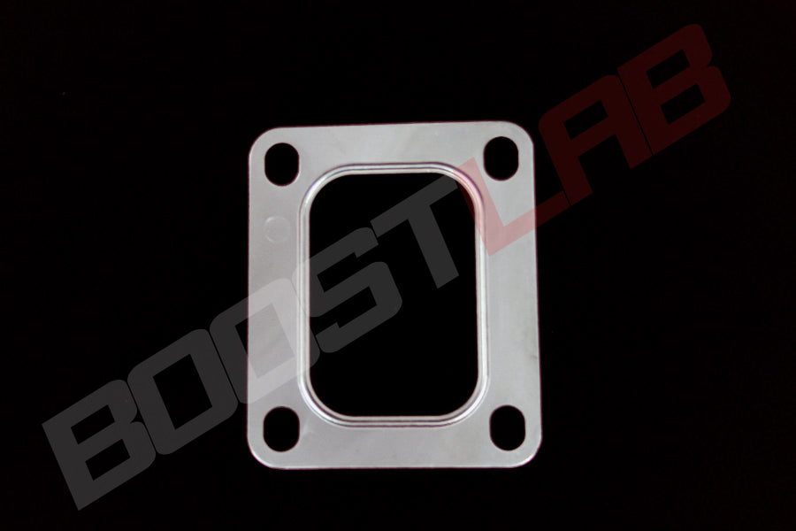 T4 turbo inlet gasket, flat metal plate with rounded rectangular center opening and four corner bolt holes, top down view