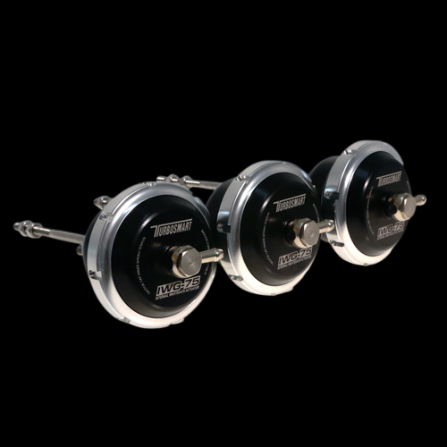 Turbosmart IWG75 Borg Warner B1 internal wastegates, three units angled view showing black actuator housings, chrome bands and linkage rods