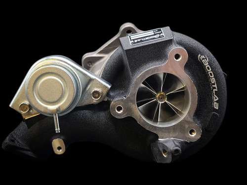 Boost Lab EVO X TD06H 62X billet turbocharger, side view showing compressor wheel, wastegate actuator and exhaust housing