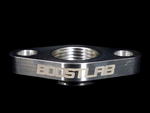 Boost Lab billet T6 large frame turbo oil drain flange, front view showing threaded 3/4 NPT center bore and two mounting holes.