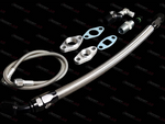 Boost Lab 2JZ single turbo oil line kit, braided hose with black fittings, gaskets, and adapters shown flat