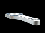 Connecting rod bottle opener, angled side view showing brushed metal finish and dual bore holes.