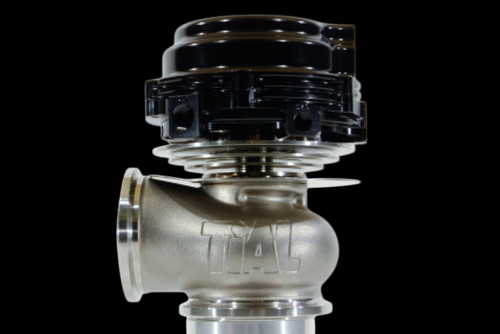 TiAL Sport MVR 44mm wastegate with black top cap, front angle showing v-band inlet and outlet flanges