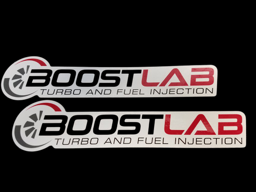 Two Boost Lab stickers with turbo wheel logo, text reading Turbo and Fuel Injection, on black background.