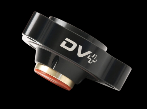 GFB DV+ diverter valve for BMW N20, angled view showing black housing, DV+ logo, red seal and brass fitting