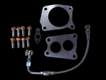 Boost Lab TD06SL2-54X turbo kit hardware, mounting flanges, oil line, and bolts on black background