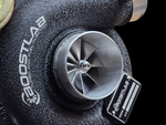 Boost Lab BL54XR turbo for Subaru STI, close up on billet compressor wheel and inlet housing.