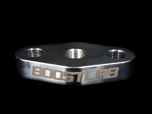 Billet aluminum turbo oil feed flange, BoostLRB laser etched logo, three NPT threaded ports, angled view