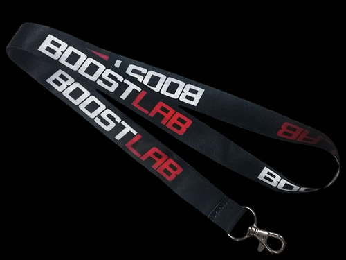 Black Boost Lab lanyard with white and red text, looped design, metal lobster clasp at end.