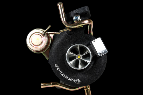 Boost Lab TD05H-20G turbocharger, front view showing compressor wheel, actuator, and gold fittings.