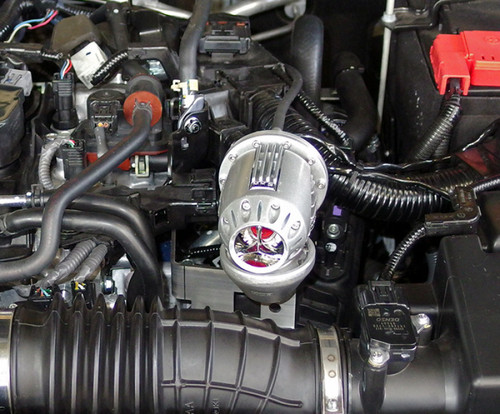 HKS Super SSQV4 BOV installed in engine bay, close up angle showing valve body and hose fittings