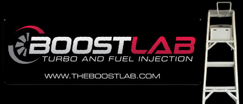 Boostlab vinyl banner, 5.50x2.00 ft, black background with turbo logo, red and white text, website URL below