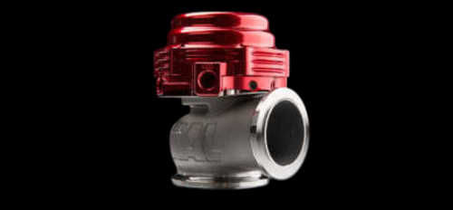TiAL Sport MVS 38mm wastegate with red top cap, side angle showing flanged inlet and outlet ports
