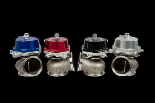 Garrett GVW-60 60mm wastegates in blue, red, black and silver, front view showing valve caps and flanges