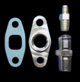 BL T3/T4 turbo oil fitting kit showing gasket, drain flange, banjo bolt, and NPT fittings laid out