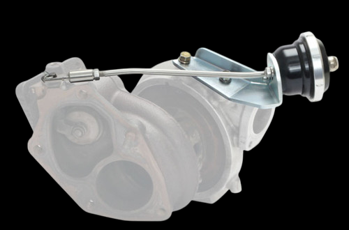 Turbosmart IWG75 black wastegate actuator with linkage arm, mounted on translucent EVO 9 turbo housing.