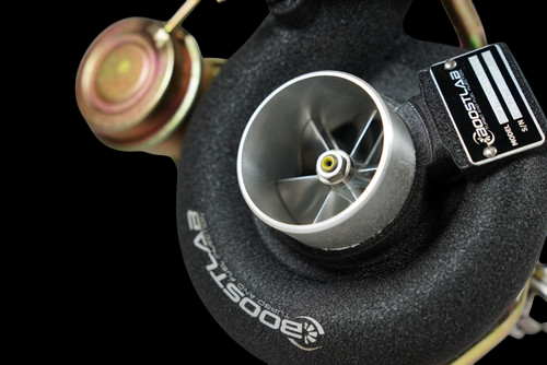 Boost Lab TD05H-20G turbocharger, front view showing compressor wheel, housing, and gold actuator